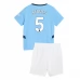 Maglia Manchester City Stones 5 Bambino Divisa Prima 2024/25 Maglia Manchester City Stones 5 Bambino Divisa Prima 2024/25