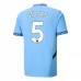 Maglia Manchester City Stones 5 Divisa Prima 2024/25 Maglia Manchester City Stones 5 Divisa Prima 2024/25